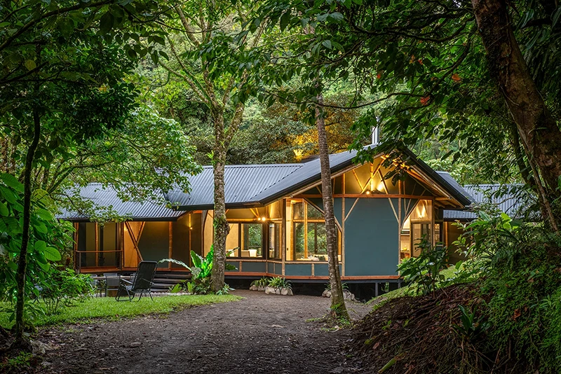 Nature Cabin at El Tigre Waterfall Cozy cabin façade nestled in the forest at El Tigre Waterfall.