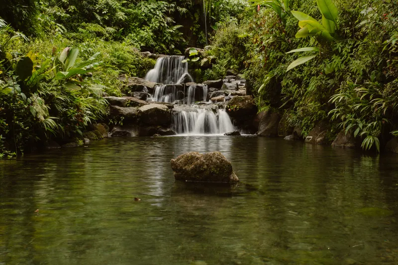 Scenic waterfall photo session location used by a La Fortuna wedding photographer for couple portraits, Costa Rica