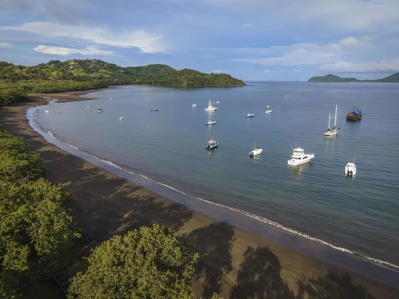 Aerial view of Playa Panamá and the Gulf of Papagayo, the beach setting of El Mangroove resort in Guanacaste