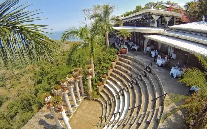 Aerial view of the Greek-style amphitheater and terraces at Villa Caletas Hotel overlooking the Pacific in Jacó, Costa Rica